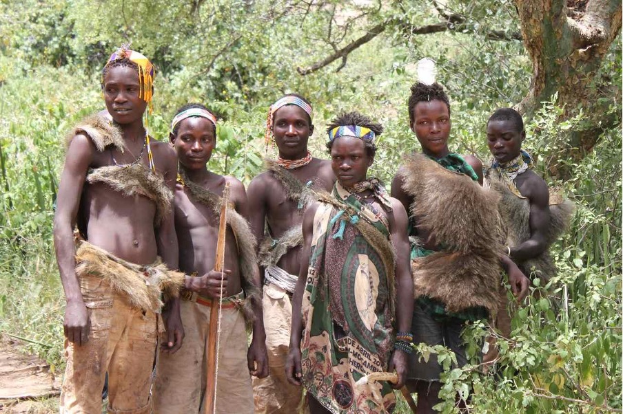 Hadzabe people engaging in traditional hunting and gathering practices